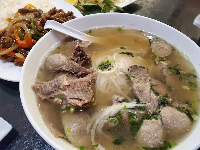 Pho noodle soup at Orchid Garden Asian Food Restaurant Saskatoon - authentic Vietnamese broth with rice noodles and fresh herbs